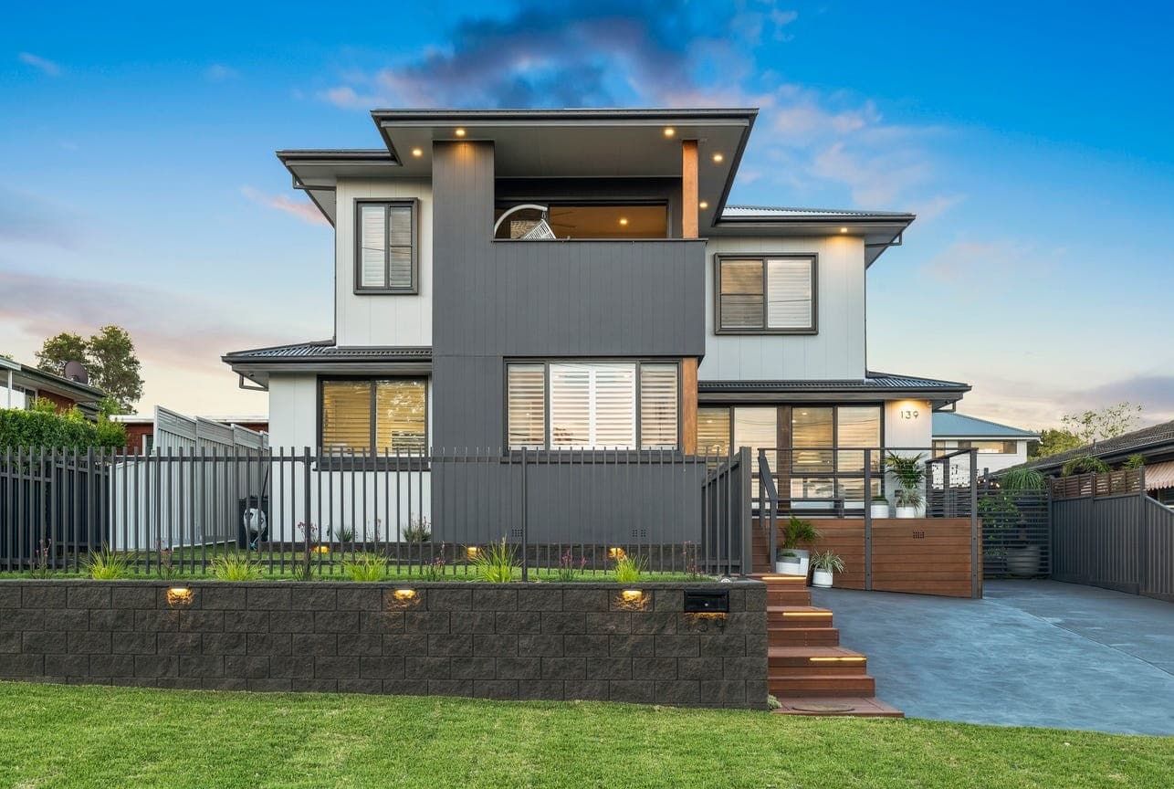 Premium residential exterior lighting installation at dusk — NS Electrics
