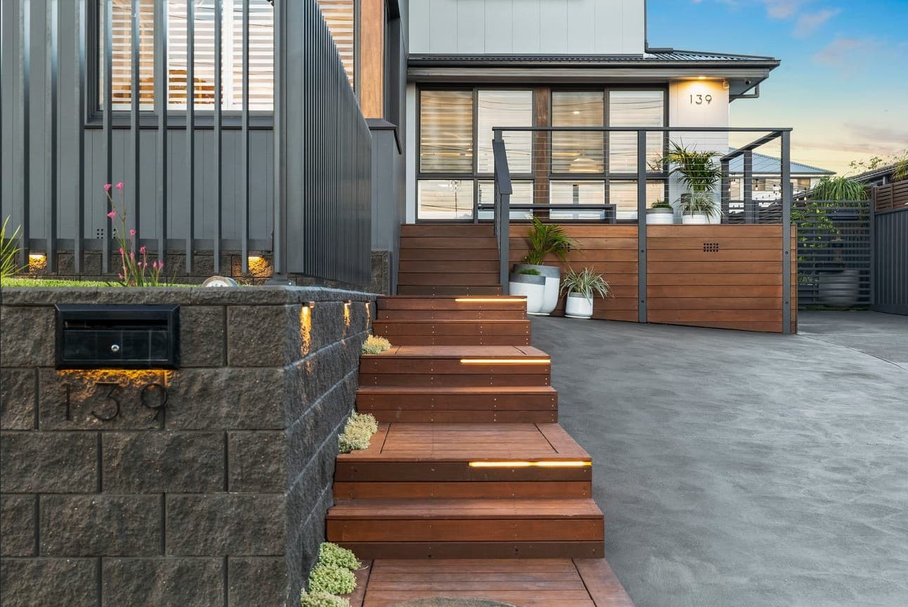 Residential entry and gatehouse with architectural step and deck lighting — NS Electrics